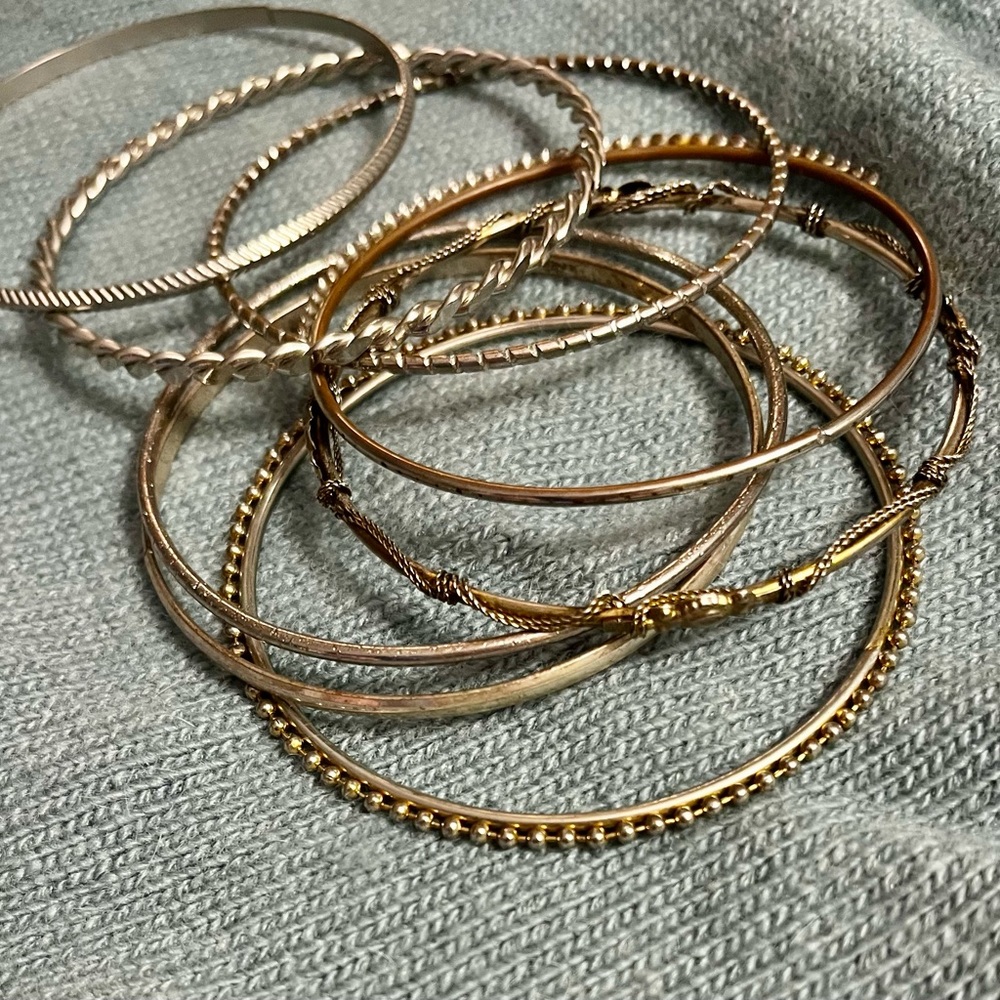 Bundle of 8 silver tone bangle bracelets